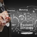 business man writing business strategy concept