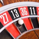 Close up of ball on roulette wheel in number thirteen