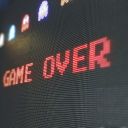 The end screen of a video game that reads 'Game Over'